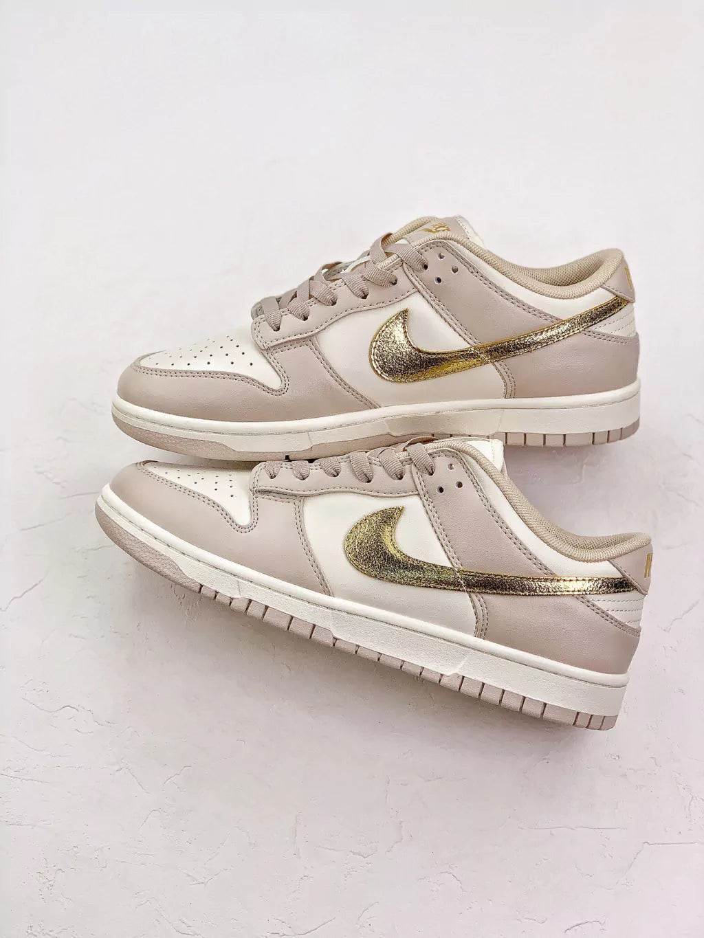 Nike Dunk Low “Gold Swoosh”