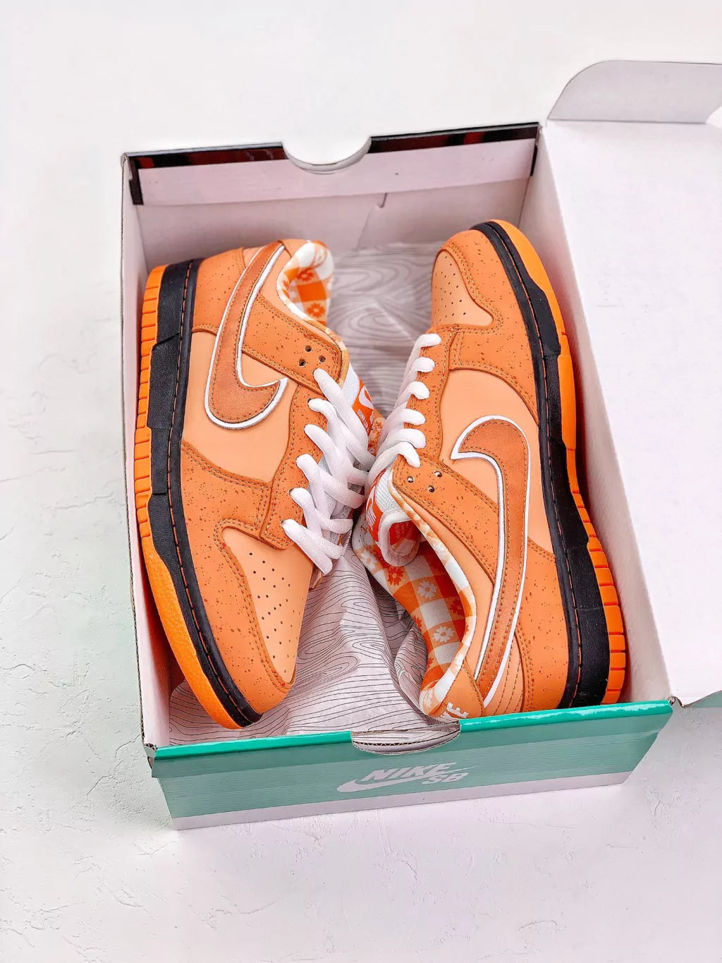 Concepts x Nike SB Dunk Low “Orange Lobster”