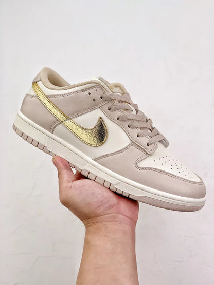 Nike Dunk Low “Gold Swoosh”