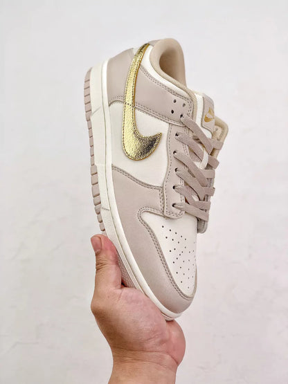 Nike Dunk Low “Gold Swoosh”